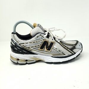 New Balance White and Black Running Shoes